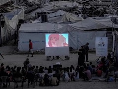 Heartbreaking Photo Shows Gaza Children Watching 'The Lion King' In Ruined Neighbourhood