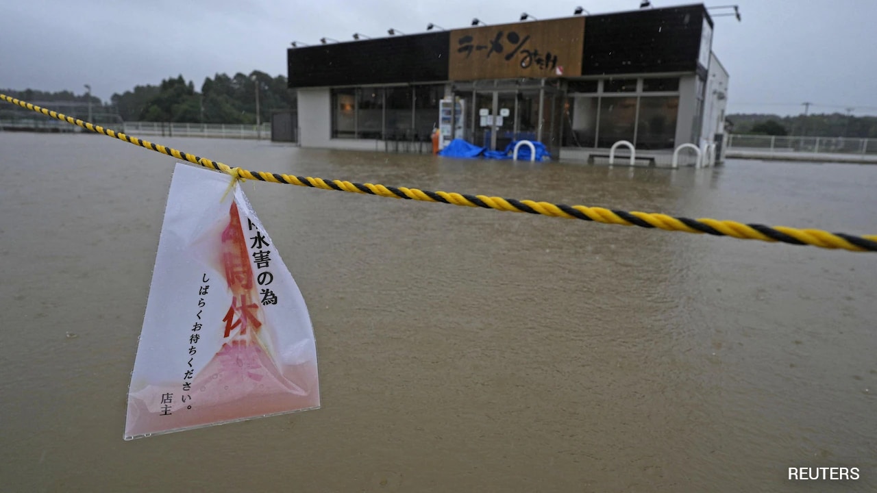 Flood, Landslide Warnings In Japan As Typhoon Dujuan Approaches East Coast