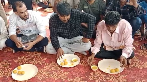 Watch: Crowds Cheer As Man Eats 28 Ladoos In 30 Minutes At Gujarat Fair