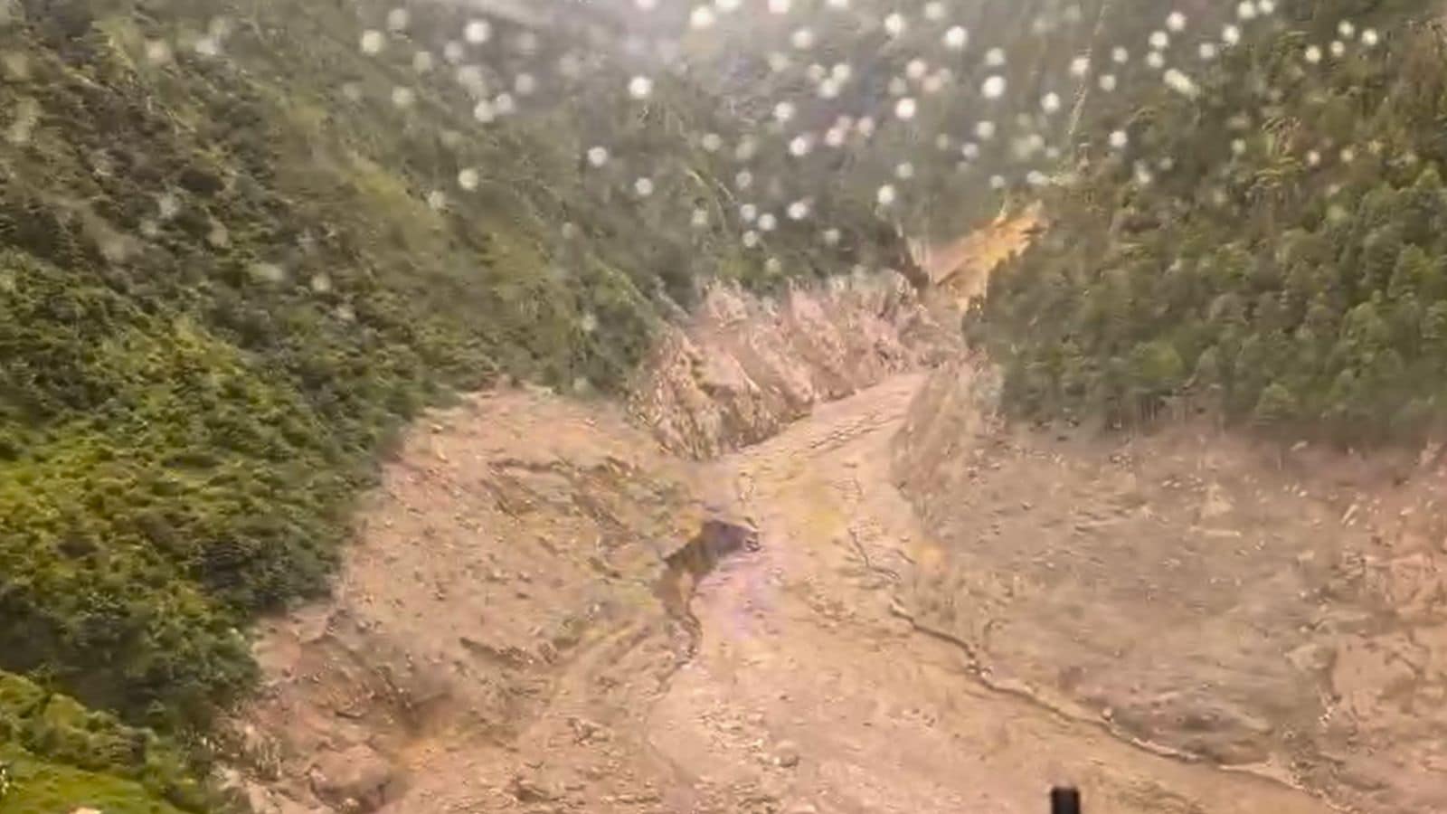 Flying low over mud tracts where houses used to exist. Flying low over mud tracts where houses used to exist.