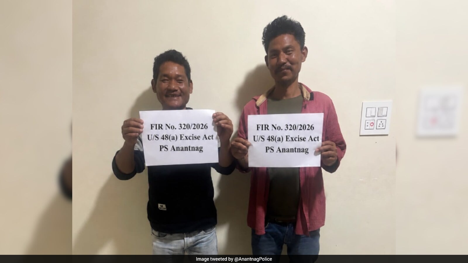 Two Men Arrested in Jammu and Kashmir Liquor Case Draw Attention with Smiling Mugshots
