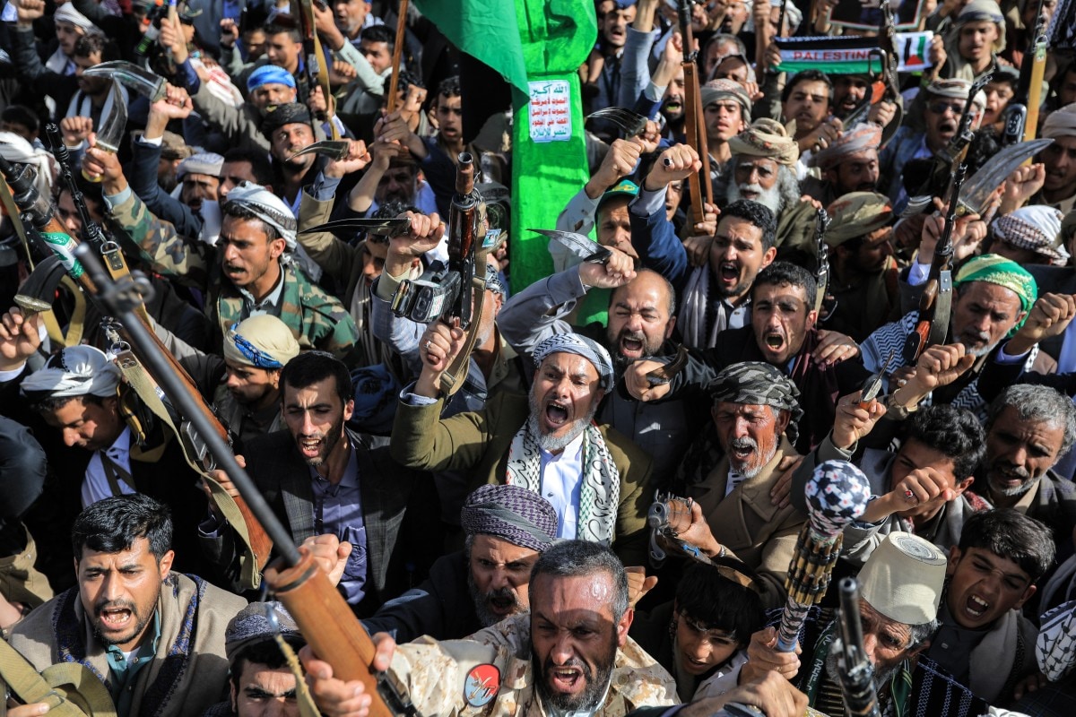 Supporters of the Iran-backed Houthi movement with their weapons as they rally in solidarity with Iran and Lebanon amid the US-Israeli war with Iran Supporters of the Iran-backed Houthi movement with their weapons as they rally in solidarity with Iran and Lebanon amid the US-Israeli war with Iran