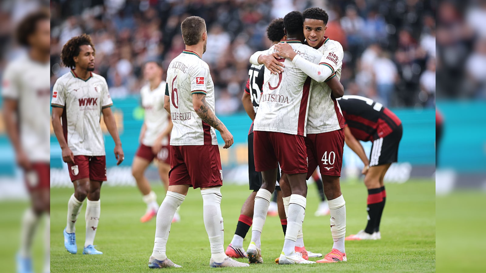Minnows Augsburg Sink Frankfurt To Top Bundesliga Table