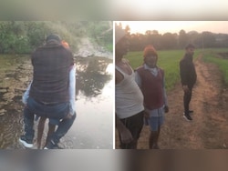 Madhya Pradesh Revenue Official Crosses Drain On Elderly Man's Back, Suspended