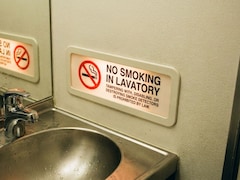 Why Do Airplanes Still Have Ashtrays When Smoking Is Banned?