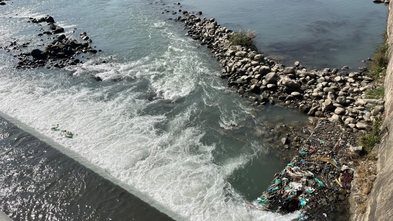 The spot where Momin is believed to have slipped into the river and was swept away. The spot where Momin is believed to have slipped into the river and was swept away.