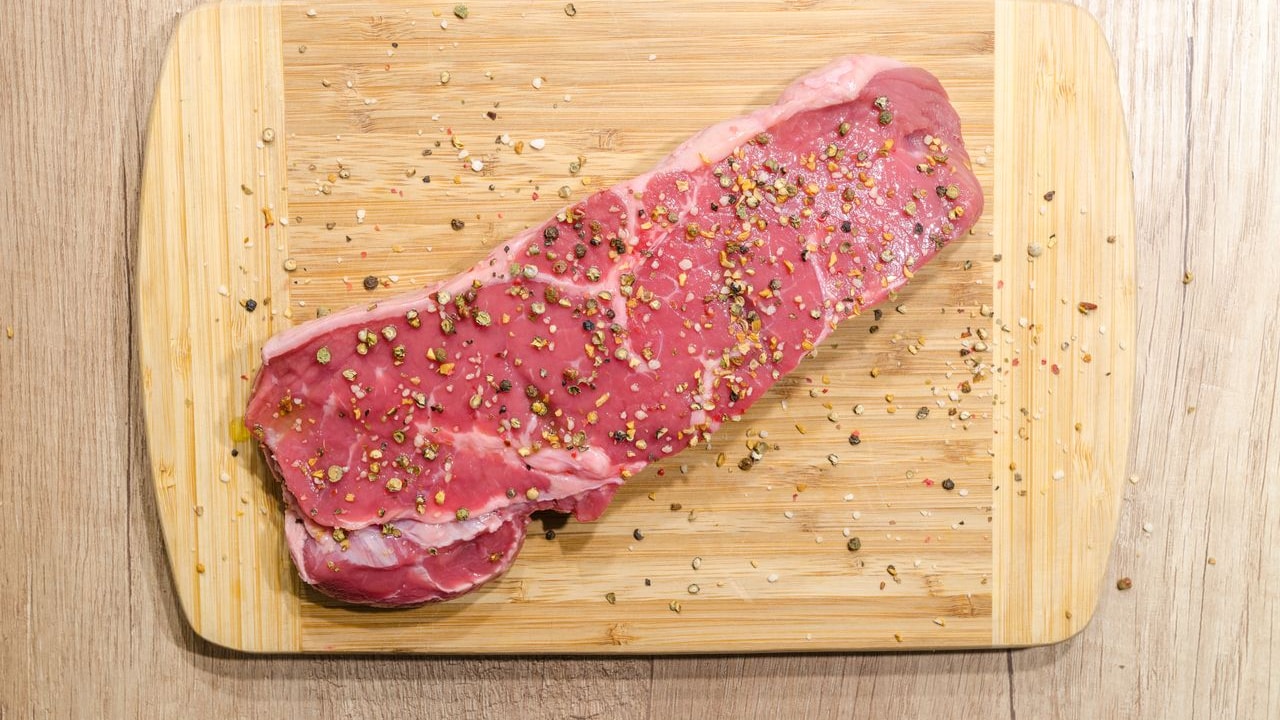 Juices from raw meat and fish can get absorbed into deep scratches and cuts