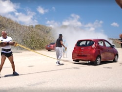 How Long Can You Hold Two Cars From Driving Away - 50-Year-Old Man Sets World Record: Video