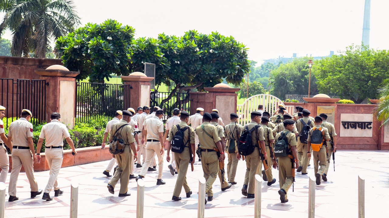 Delhi police personnel deploy outside Rajghat during a security mock drill to ensure foolproof security ahead of the BRICS Summit. Delhi police personnel deploy outside Rajghat during a security mock drill to ensure foolproof security ahead of the BRICS Summit.