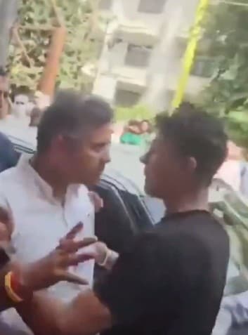 Delhi Minister Parvesh Verma and the young man he slapped