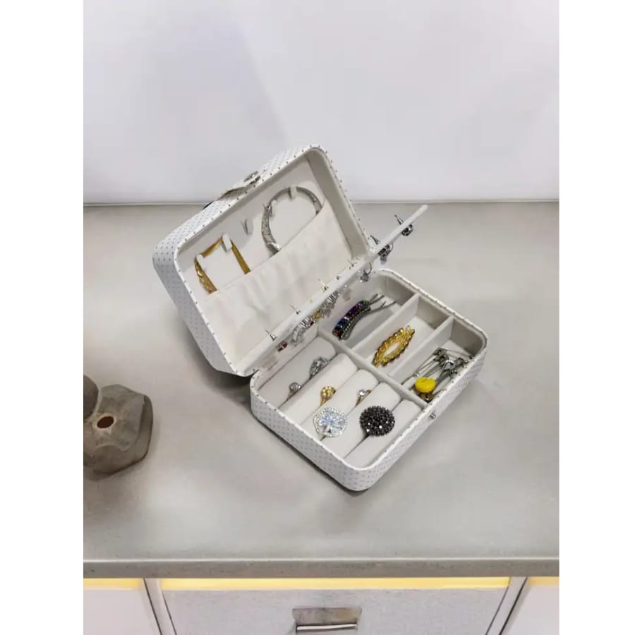 Click here to buy: Ayushman Enterprise Portable Dot Rexin Jewelry Organizer Click here to buy: Ayushman Enterprise Portable Dot Rexin Jewelry Organizer