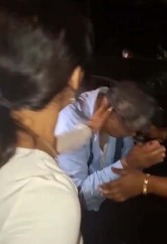 A woman is seen slapping the accused driver
