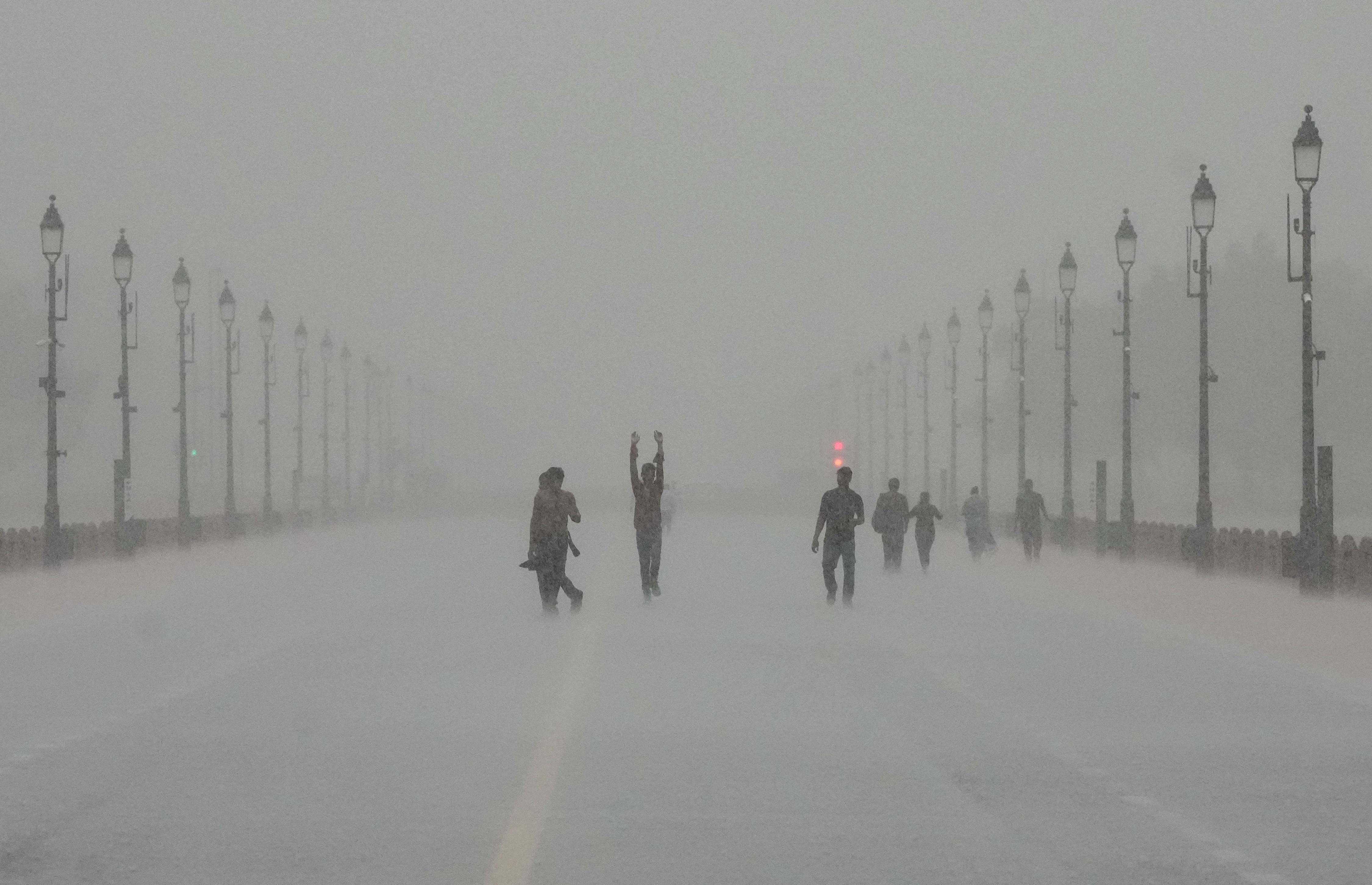 Heavy rain disrupts Delhi airport operations, with nine flights diverted and 400 delays reported