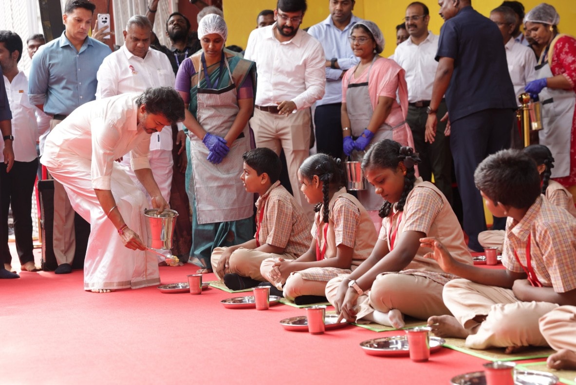 Vijay seen serving breakfast to school students Vijay seen serving breakfast to school students