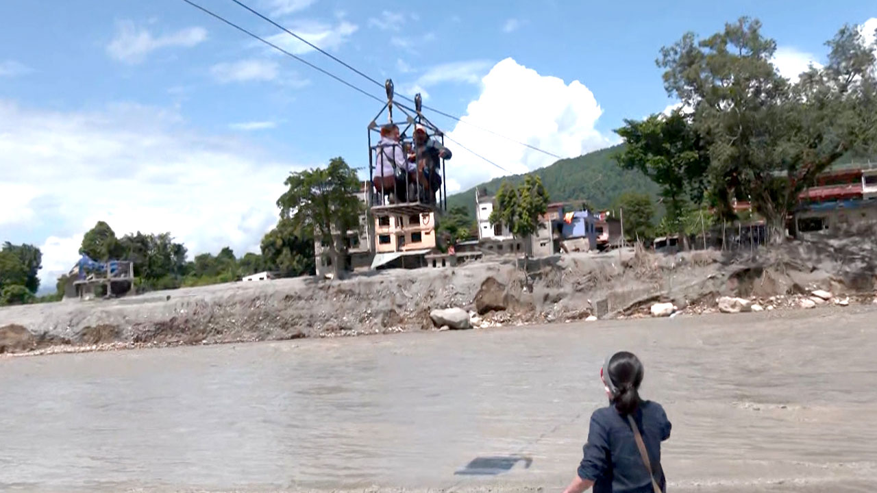 Cut Off, Not Broken: Nepal's Flood Survivors Rely On A Zipline To Cross Trishuli River