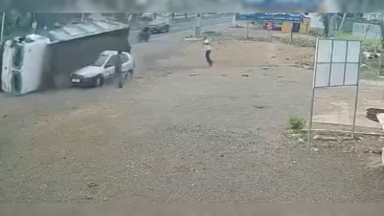 Video: Sand-Laden Truck Swerves, Topples, Buries Car In Junagadh. 2 Men Narrowly Escape