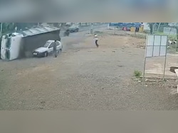 Video: Sand-Laden Truck Swerves, Topples, Buries Car In Junagadh. 2 Men Narrowly Escape
