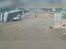 Video: Sand-Laden Truck Swerves, Topples, Buries Car In Junagadh. 2 Men Narrowly Escape