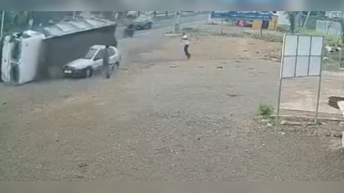 Video: Sand-Laden Truck Swerves, Topples, Buries Car In Junagadh. 2 Men Narrowly Escape