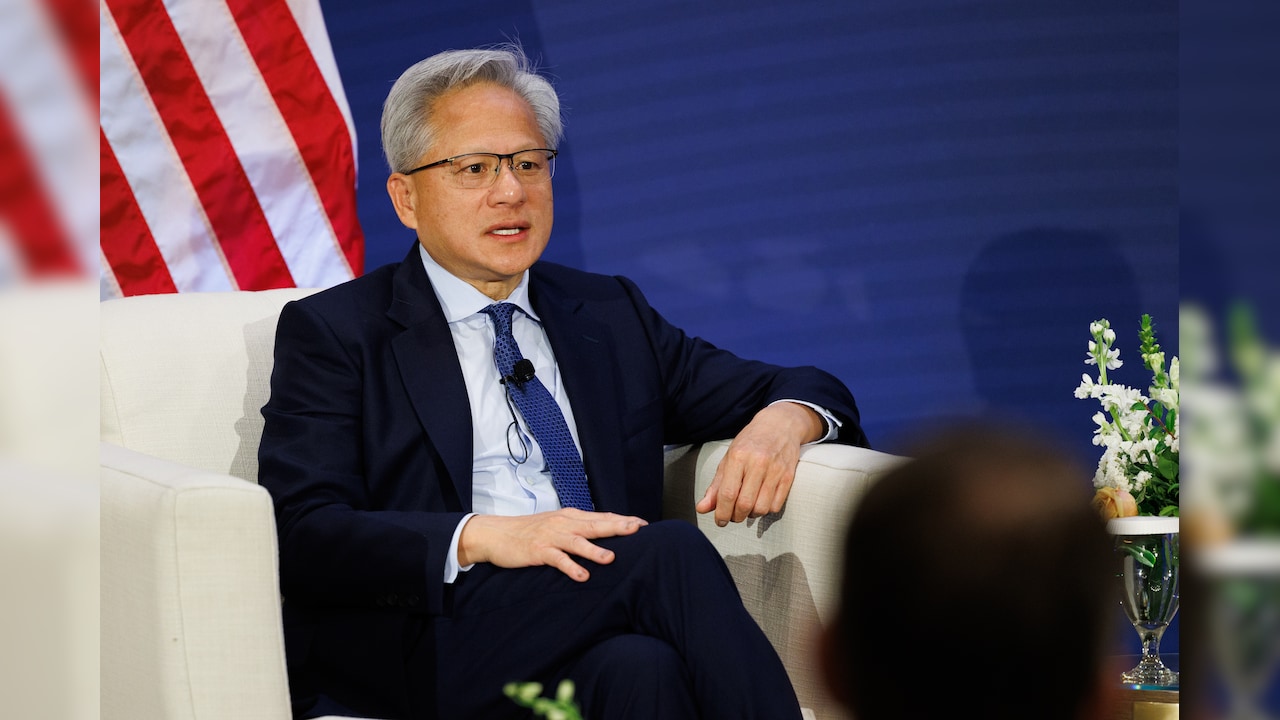 Nvidia CEO Puts Trump On Phone While Downplaying AI Risks
