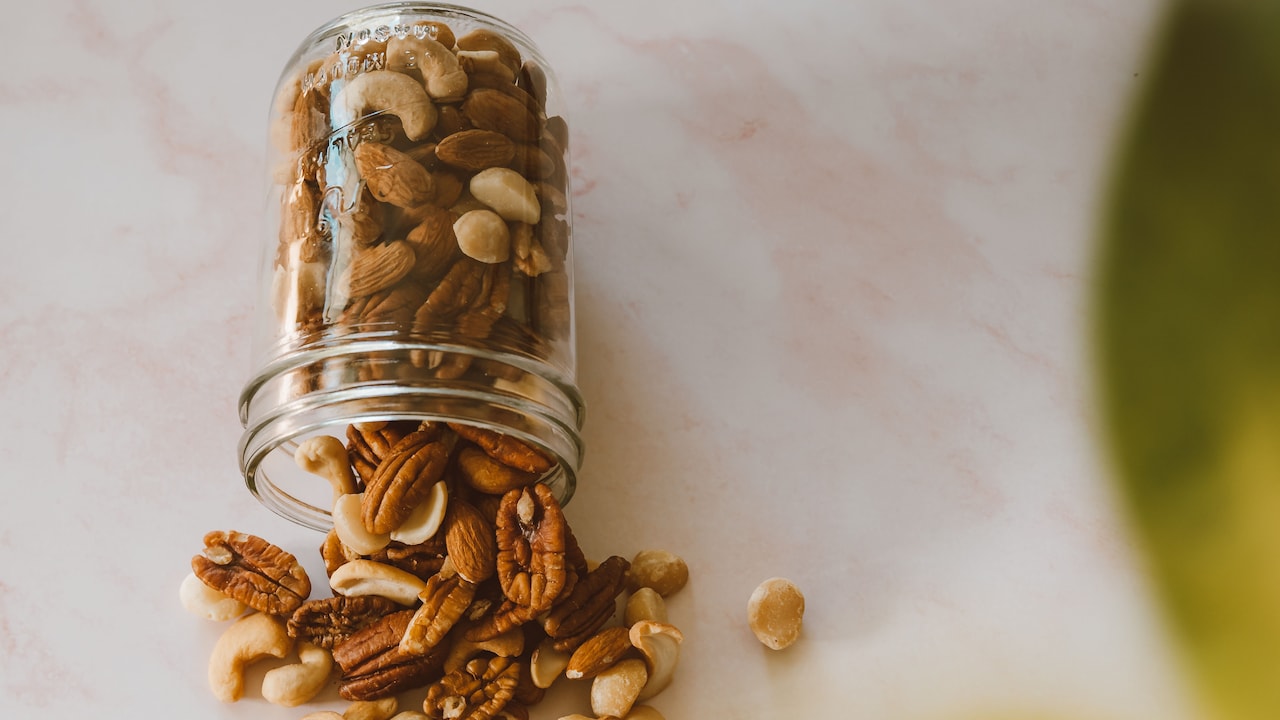 A bowl of mixed dry fruits, nuts, and seeds, ready to be enjoyed as a wholesome everyday snack A bowl of mixed dry fruits, nuts, and seeds, ready to be enjoyed as a wholesome everyday snack