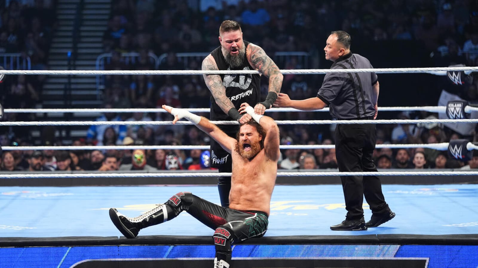 CM Punk Returns During Sami Zayn vs Kevin Owens WWE Title Match As Referee Botch Changes Ending