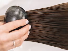 Washing Your Hair Daily? Why Your Tap Water Might Be Stealing Its Shine