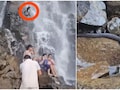 महाराष्ट्र में झरने के पास बच्चे को गोद में लेकर खड़े शख्स पर गिरा बड़ा सांप, टूरिस्ट ने शेयर किया वीडियो