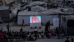 Heartbreaking Photo Shows Gaza Children Watching 'The Lion King' In Ruined Neighbourhood
