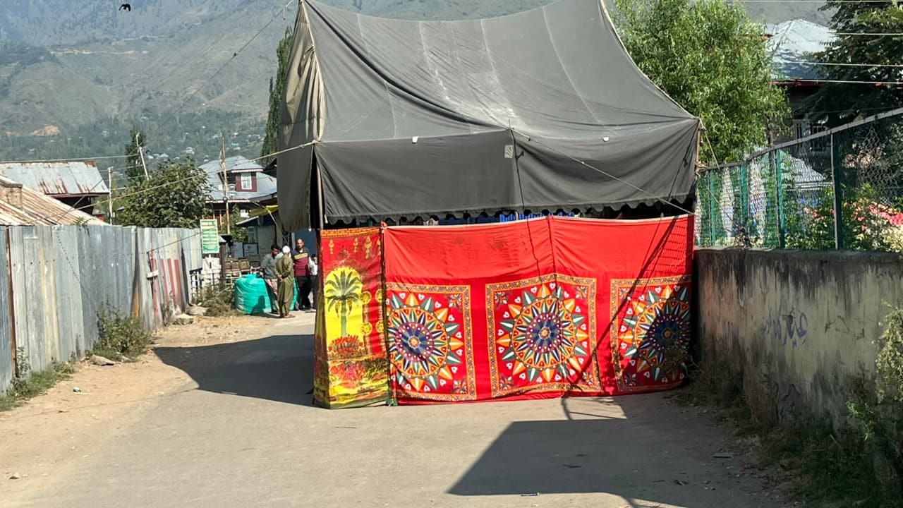 Villagers have erected a tent along the riverside, where Momins mother waits between hope and heartbreak. Villagers have erected a tent along the riverside, where Momins mother waits between hope and heartbreak.