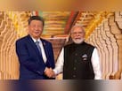 BRICS राष्ट्राध्यक्षों के साथ जहां पीएम मोदी ने मिलाए हाथ, जानें उसके पीछे लगी तस्वीर की कहानी