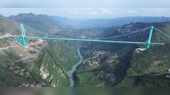Watch: China Turns World's Highest Bridge Into A Spectacular 'River In The Sky'
