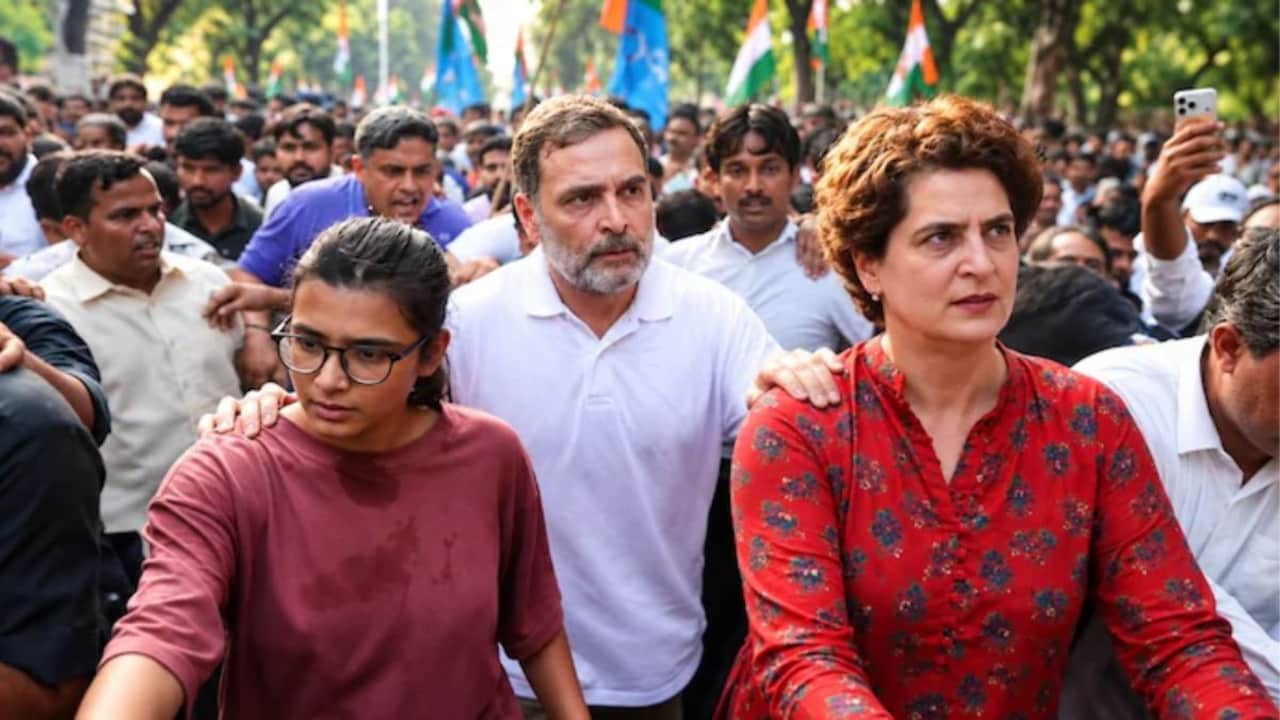 AISAs Neha Bora with Rahul and Priyanka Gandhi during the Monday march