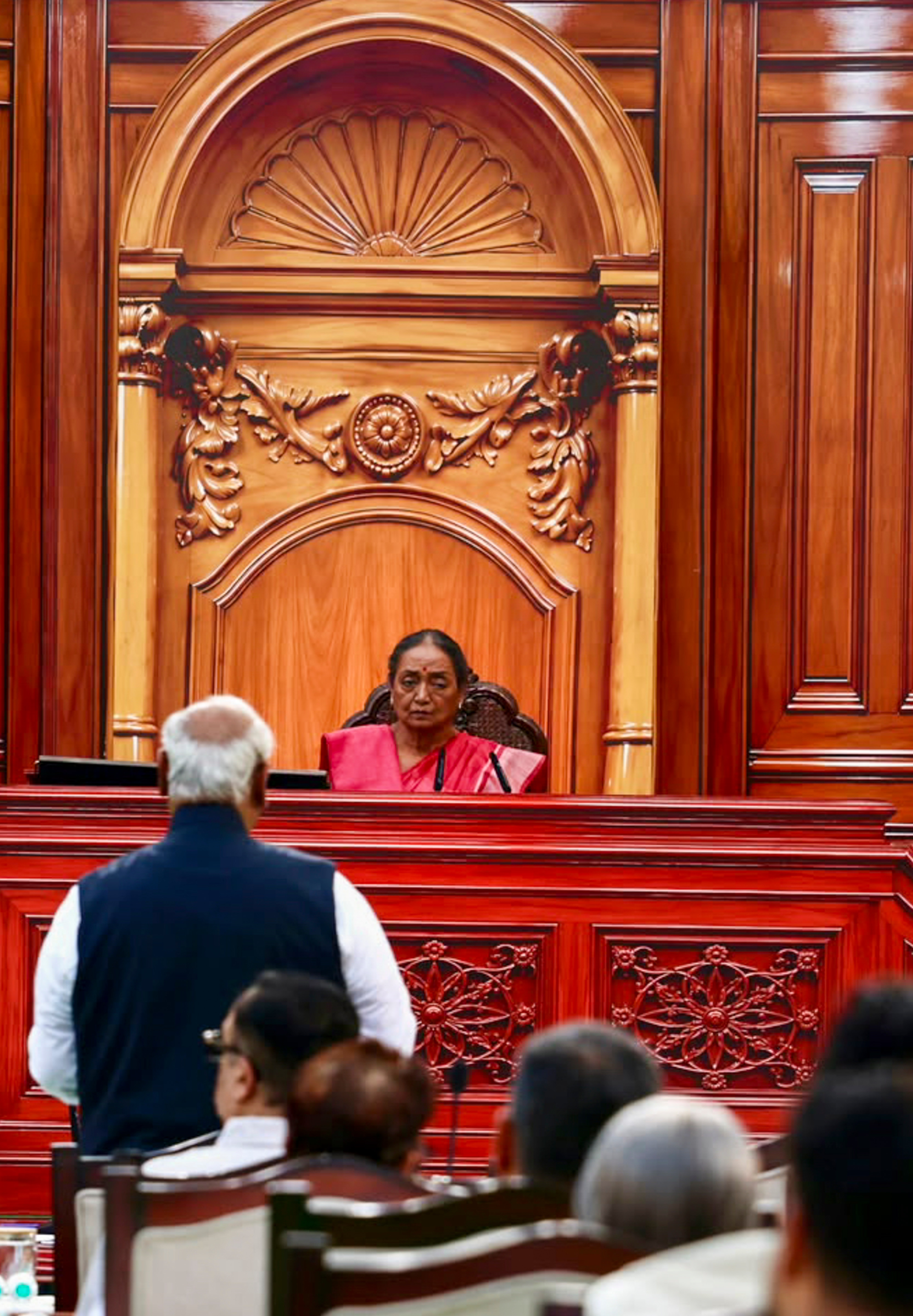 Meira Kumar looks on as Mallikarjun Kharge speaks during the mock parliament sitting.
