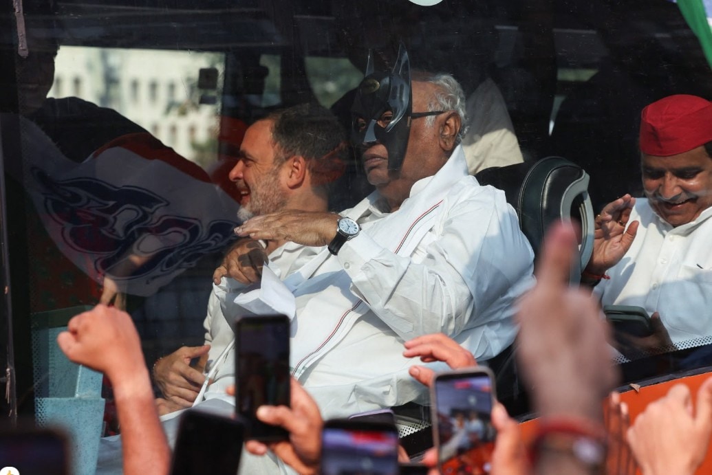 M Kharge spotted with the Batman mask during INDIA bloc protest rally 