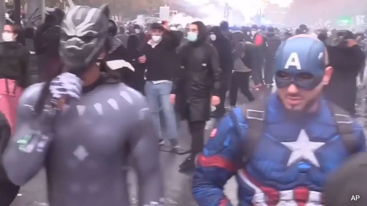 Video: Superheroes 'Black Panther', 'Captain America' Join France Protests