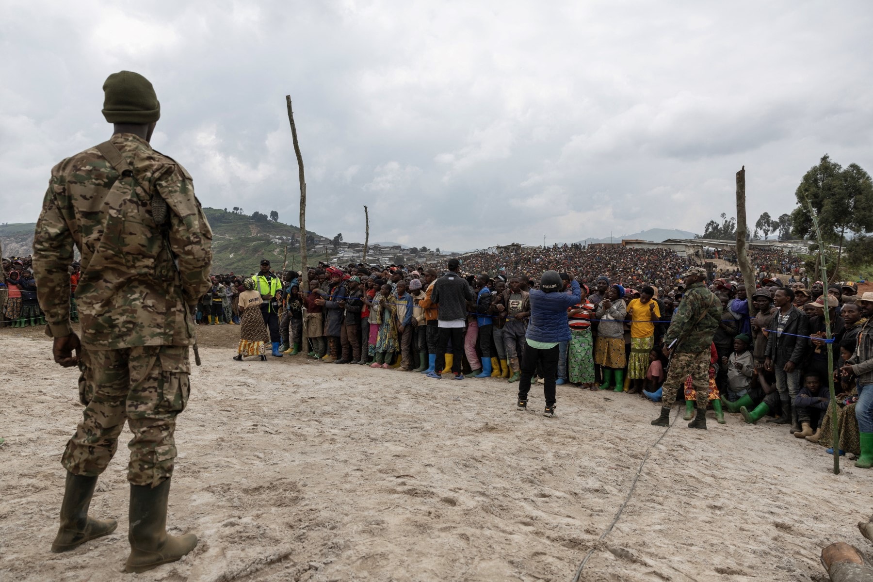 Miners gather during a M23 movement rally at the mine in Rubay on March 5, 2025. Ravaged by conflict for 30 years, eastern DRC is believed to hold between 60% and 80% of the worlds reserves of coltan, an essential mineral for manufacturing electronic equipment. UN experts say that the Rubaya deposits bring in around $800,000 per month to the M23, thanks to a tax of $7 per kilogram levied on the production and trade of coltan. Miners gather during a M23 movement rally at the mine in Rubay on March 5, 2025. Ravaged by conflict for 30 years, eastern DRC is believed to hold between 60% and 80% of the worlds reserves of coltan, an essential mineral for manufacturing electronic equipment. UN experts say that the Rubaya deposits bring in around $800,000 per month to the M23, thanks to a tax of $7 per kilogram levied on the production and trade of coltan.