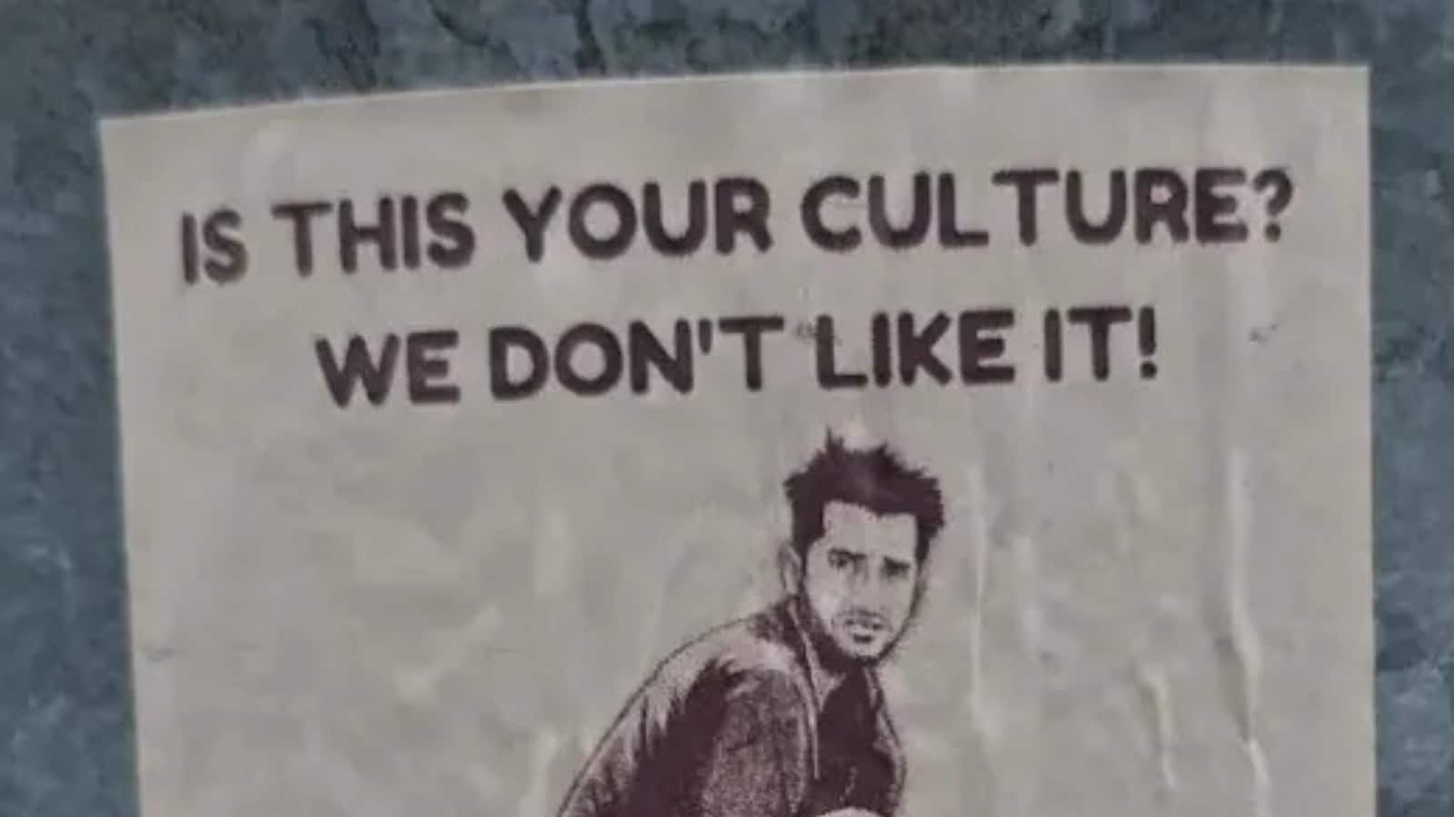 “Is This Your Culture?” Racist Stickers In Australia Show Indian Man Squatting