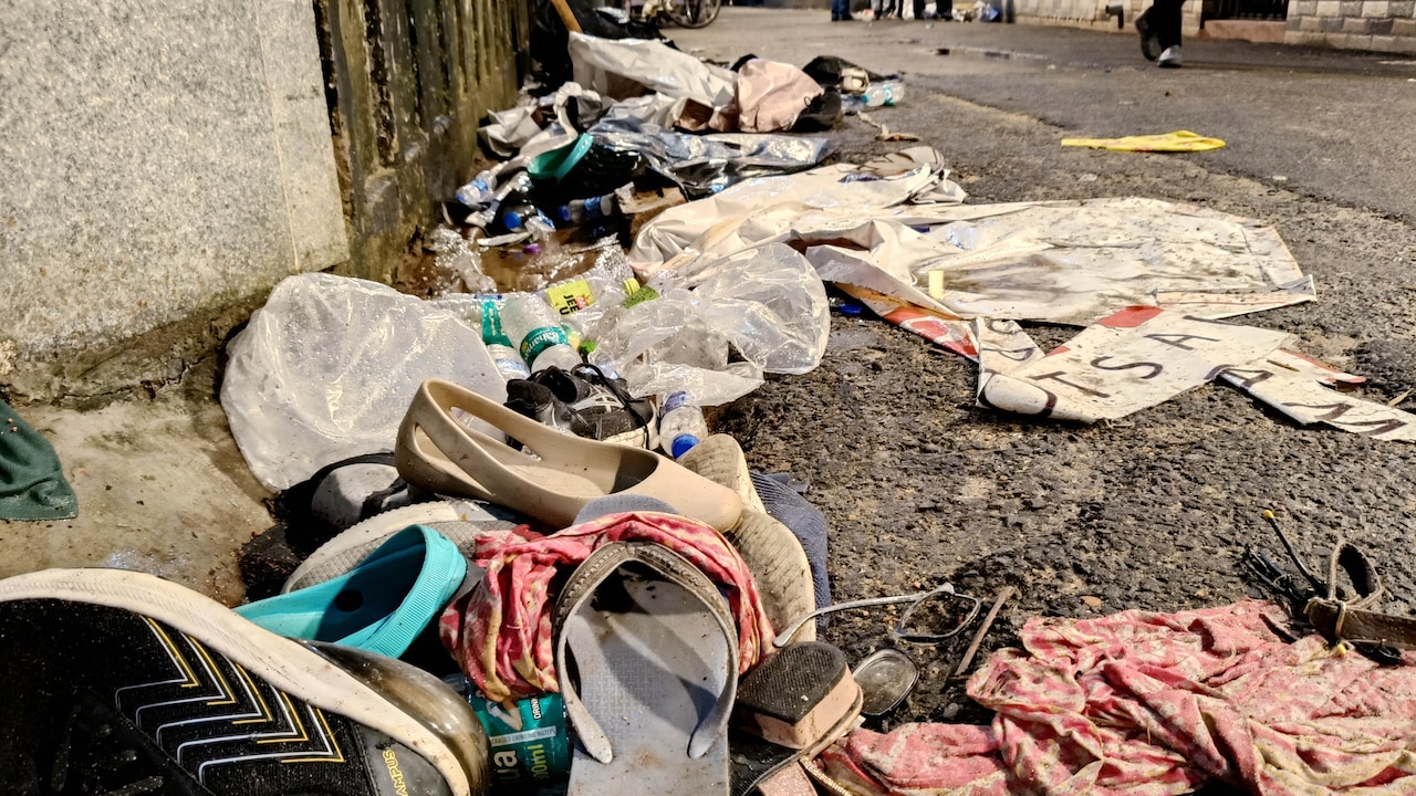 Footwear and other items lie scattered after a stampede at the Chorbagan Sarbojanin Durga Puja pandal in Kolkata