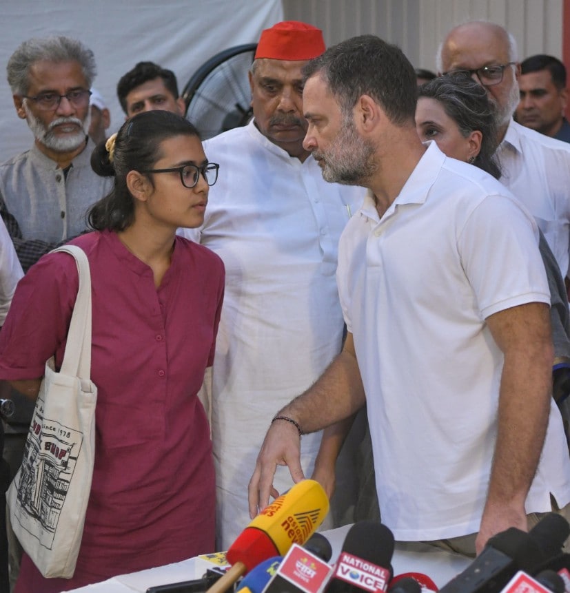 Rahul Gandhi and AISA chief Neha Bora interact during the INDIA bloc press conference in Delhi over the Special Intensive Revision Rahul Gandhi and AISA chief Neha Bora interact during the INDIA bloc press conference in Delhi over the Special Intensive Revision