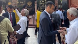 Man Fixes Son's Coat, Combs His Hair Before Interview. Video Wins Hearts