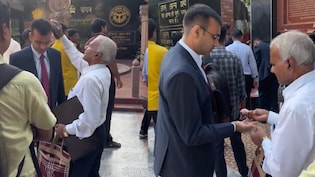 Man Fixes Son's Coat, Combs His Hair Before Interview. Video Wins Hearts