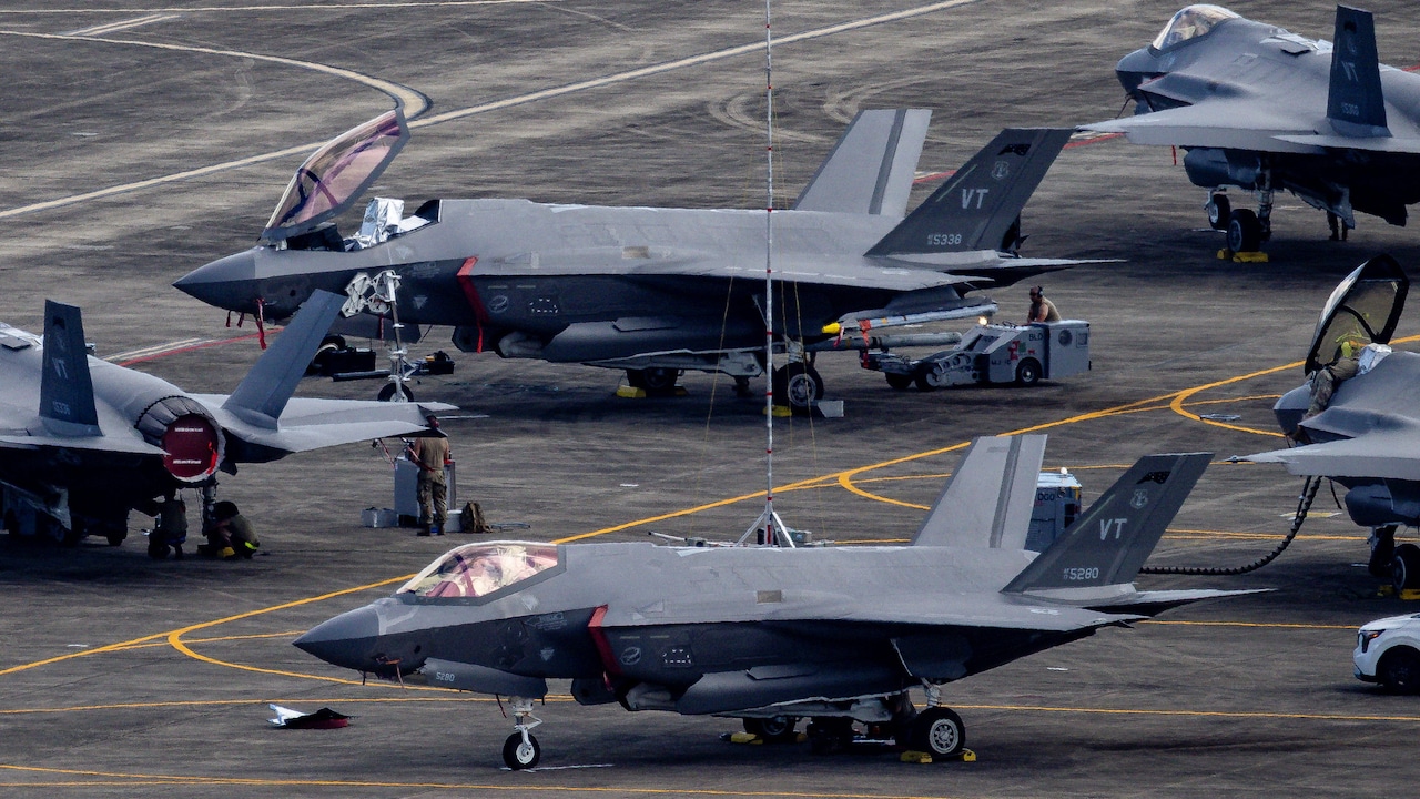 US Air Force F-35 Lightning II fighter jets parked on the tarmac at a naval base in Puerto Rico US Air Force F-35 Lightning II fighter jets parked on the tarmac at a naval base in Puerto Rico