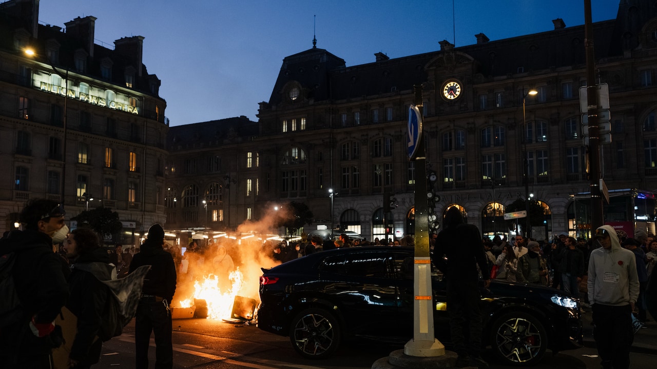A fire burns at a demonstration near Gare Saint-Lazare in Paris on Saturday. A fire burns at a demonstration near Gare Saint-Lazare in Paris on Saturday.