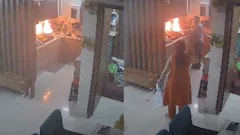Watch: Heroic Delivery Agent Puts Out Kitchen Fire During Parcel Delivery