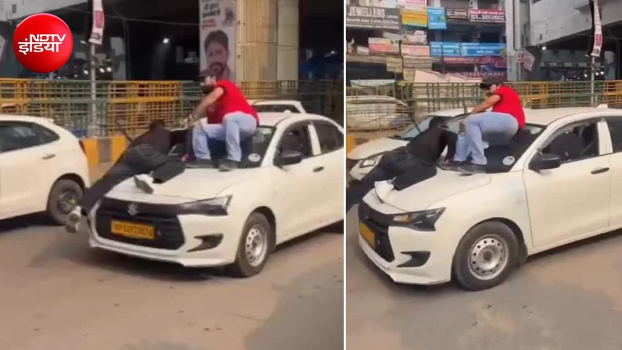 बोनट पर लटका युवक और हाई स्पीड में कार... हैरान करने वाला वीडियो वायरल, पुलिस ने शुरू की जांच