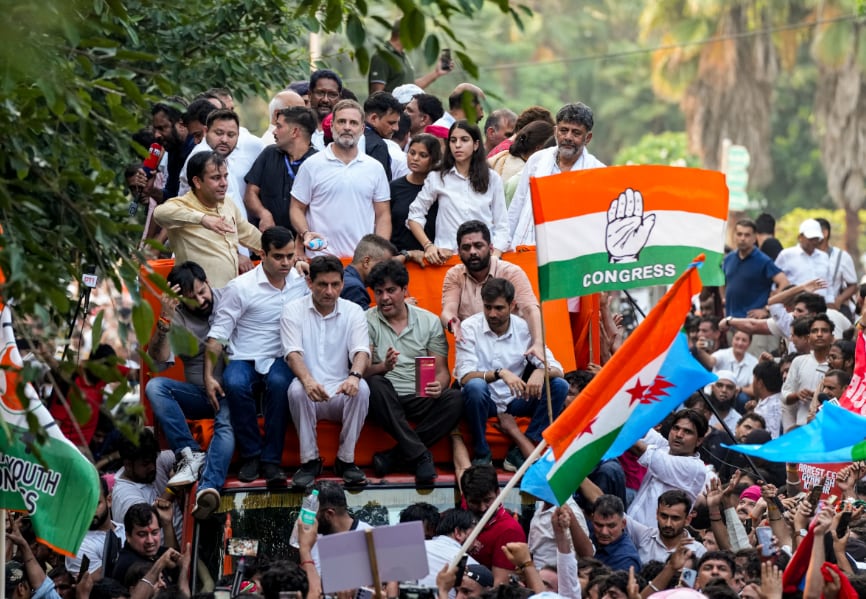 Karnataka Chief Minister DK Shivakumar, Congress leaders Rahul Gandhi, Imran Pratapgarhi and Deepender Singh Hooda, RJD leader Tejashwi Yadav, and others INDIA bloc leaders proceed in a bus towards the Supreme Court to file a petition against Special Intensive Revision (SIR) of electoral rolls and alleged poll irregularities during March for Democracy, in New Delhi, Monday. Karnataka Chief Minister DK Shivakumar, Congress leaders Rahul Gandhi, Imran Pratapgarhi and Deepender Singh Hooda, RJD leader Tejashwi Yadav, and others INDIA bloc leaders proceed in a bus towards the Supreme Court to file a petition against Special Intensive Revision (SIR) of electoral rolls and alleged poll irregularities during March for Democracy, in New Delhi, Monday.
