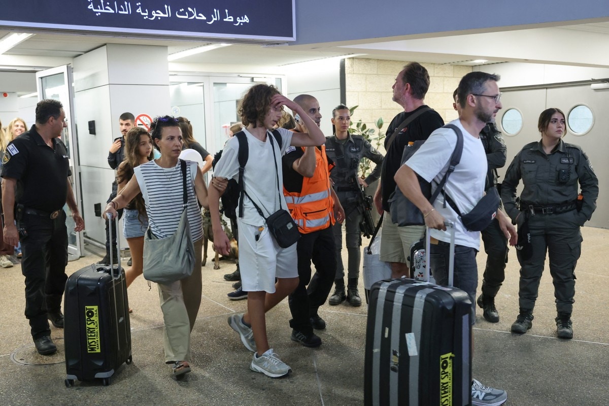 Passengers from the flydubai flight after landing at Israels Ben Gurion Airport Passengers from the flydubai flight after landing at Israels Ben Gurion Airport