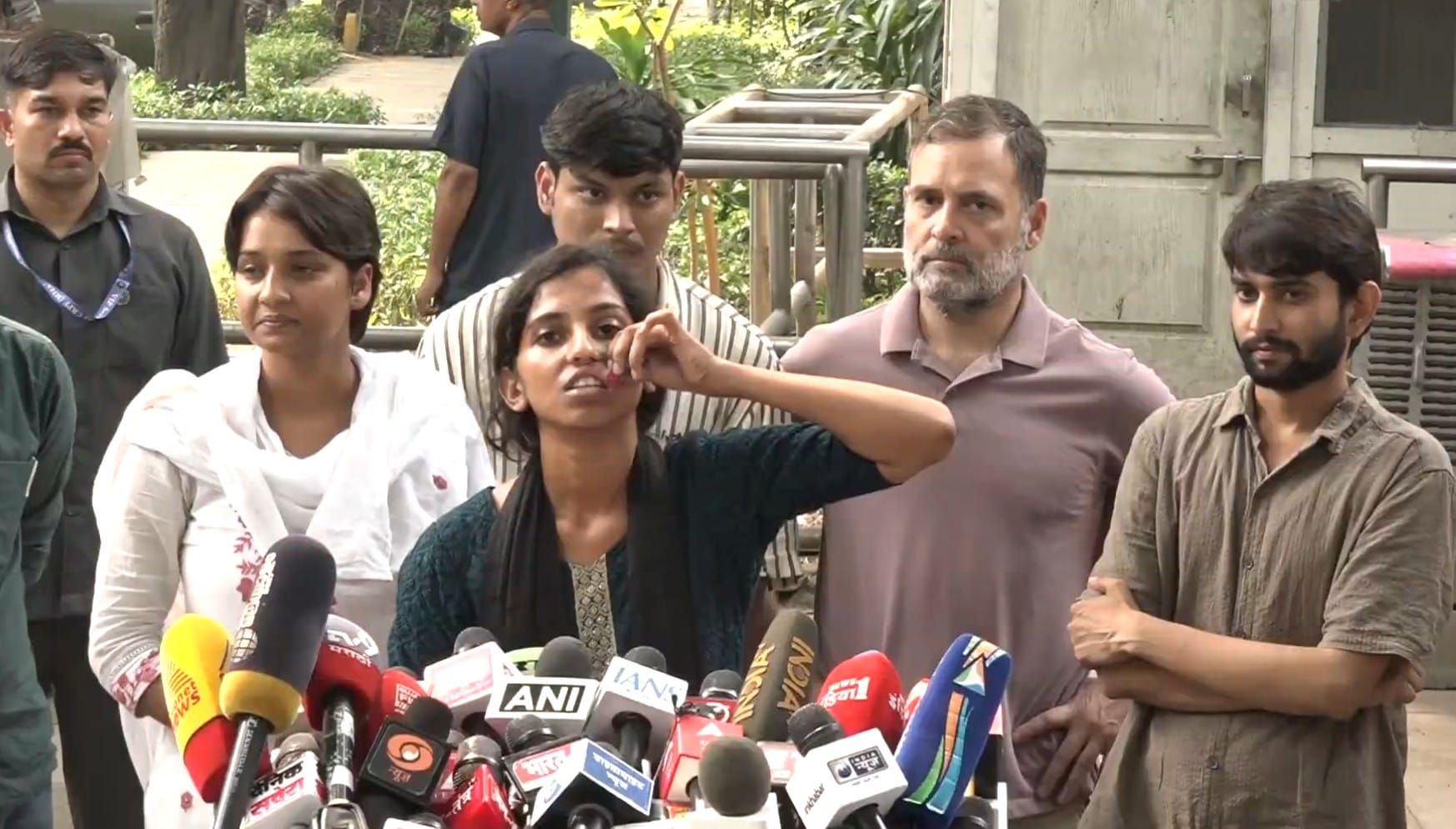 A woman protester, a Delhi University student, claims she was slapped so hard that it bruised her lip A woman protester, a Delhi University student, claims she was slapped so hard that it bruised her lip