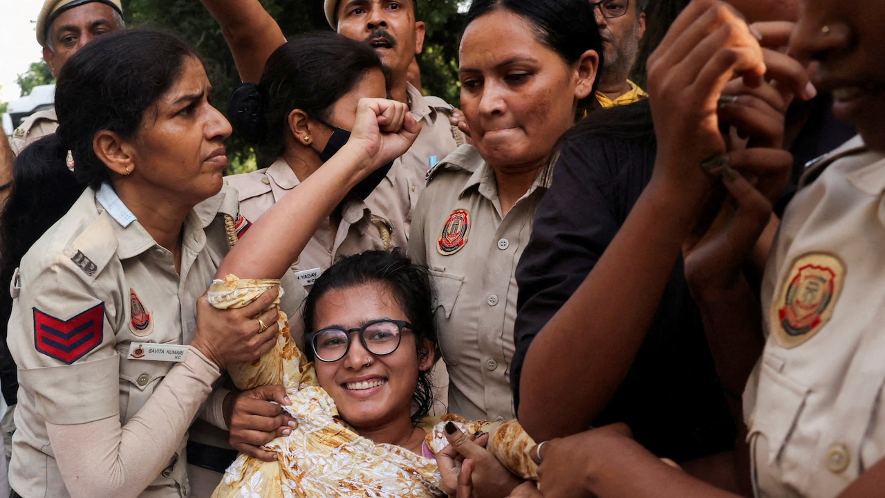 Neha Bora reacts after being detained by Delhi Police on Saturday. Neha Bora reacts after being detained by Delhi Police on Saturday.